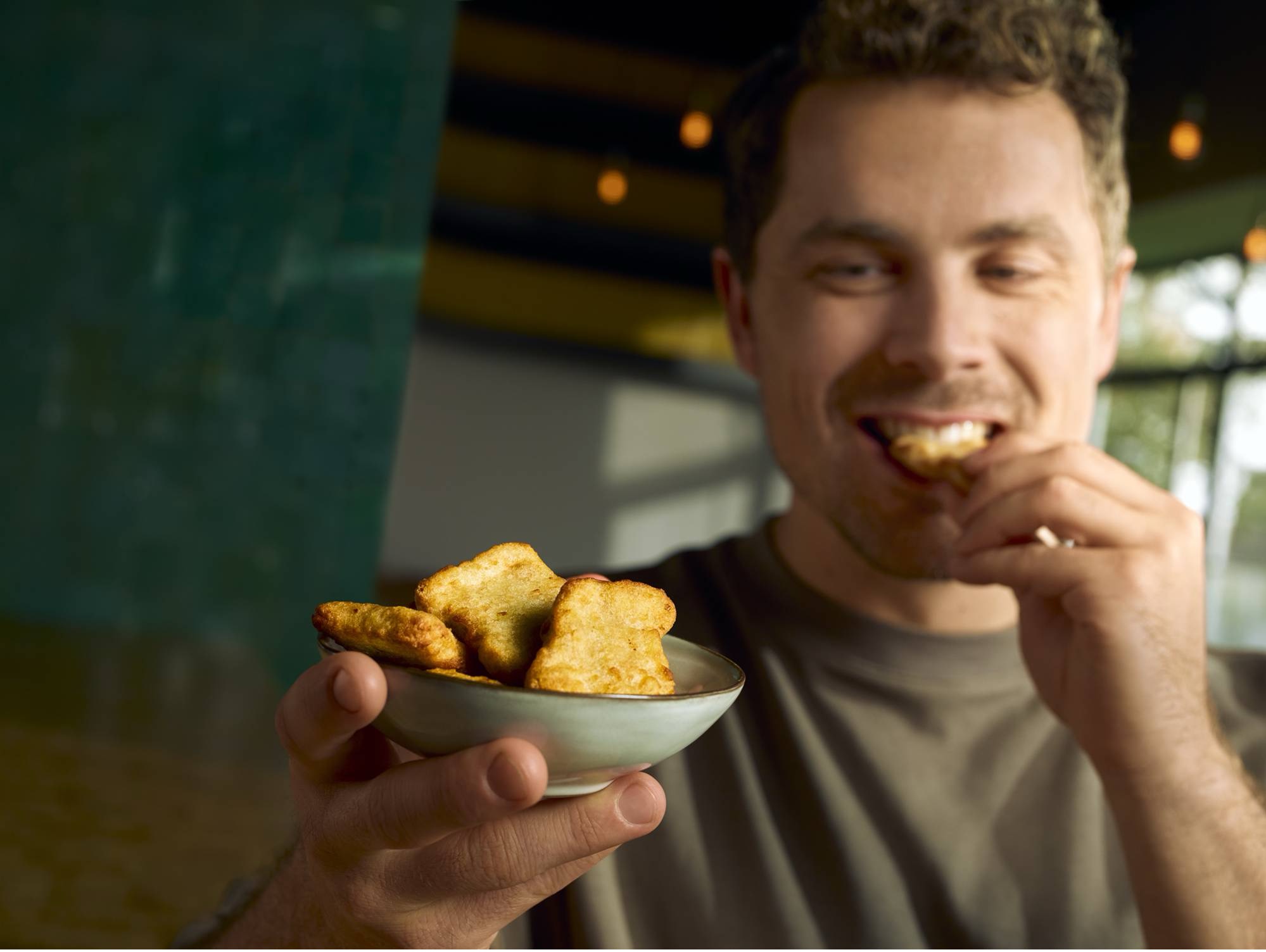 Coating that sticks through frying, freezing and the supply chain